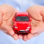 Hand with car
